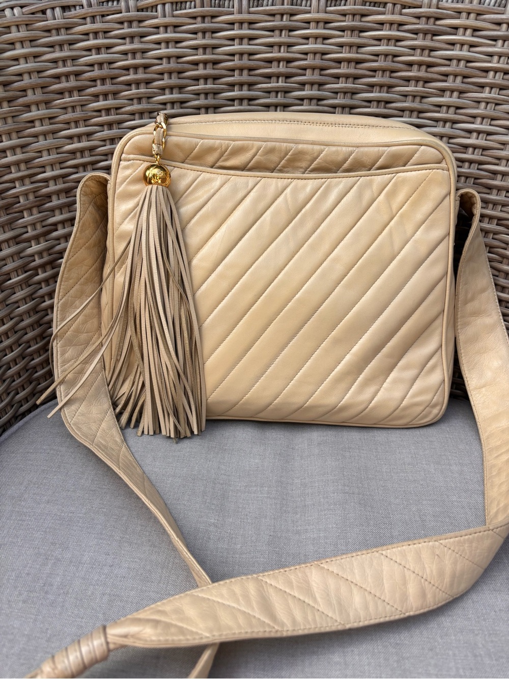 Authentic CHANEL beige leather tassel camera crossbody bag